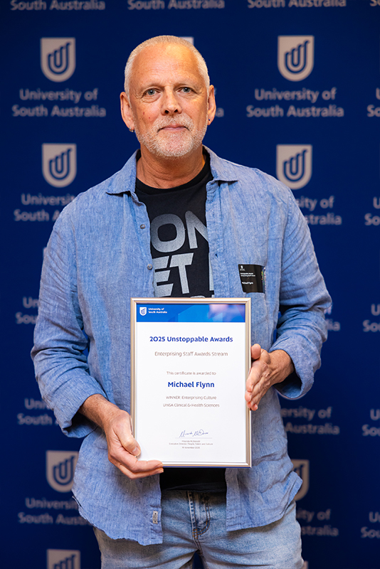 20251119_Enterprising_Staff_Awards-64_MICHAEL FLYNN_WINNER.jpg