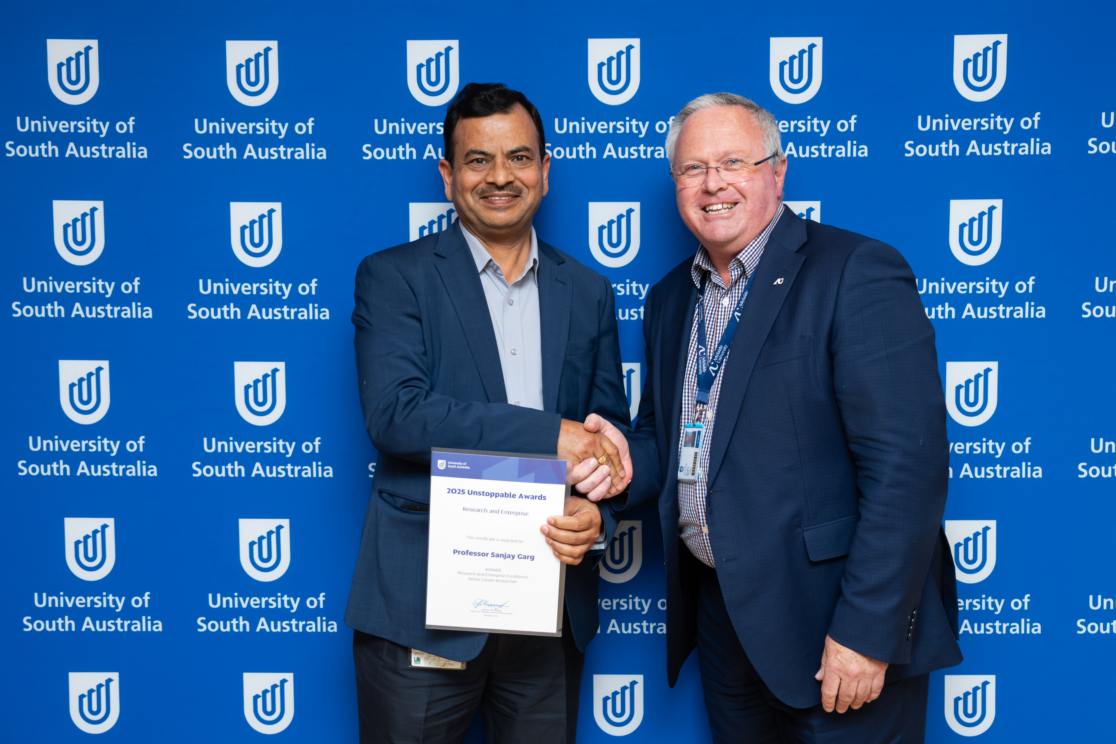 Professor Sanjay Garg is awarded the Senior-Career Researcher Award by the Deputy Vice Chancellor: Research & Enterprise, Professor Peter Murphy