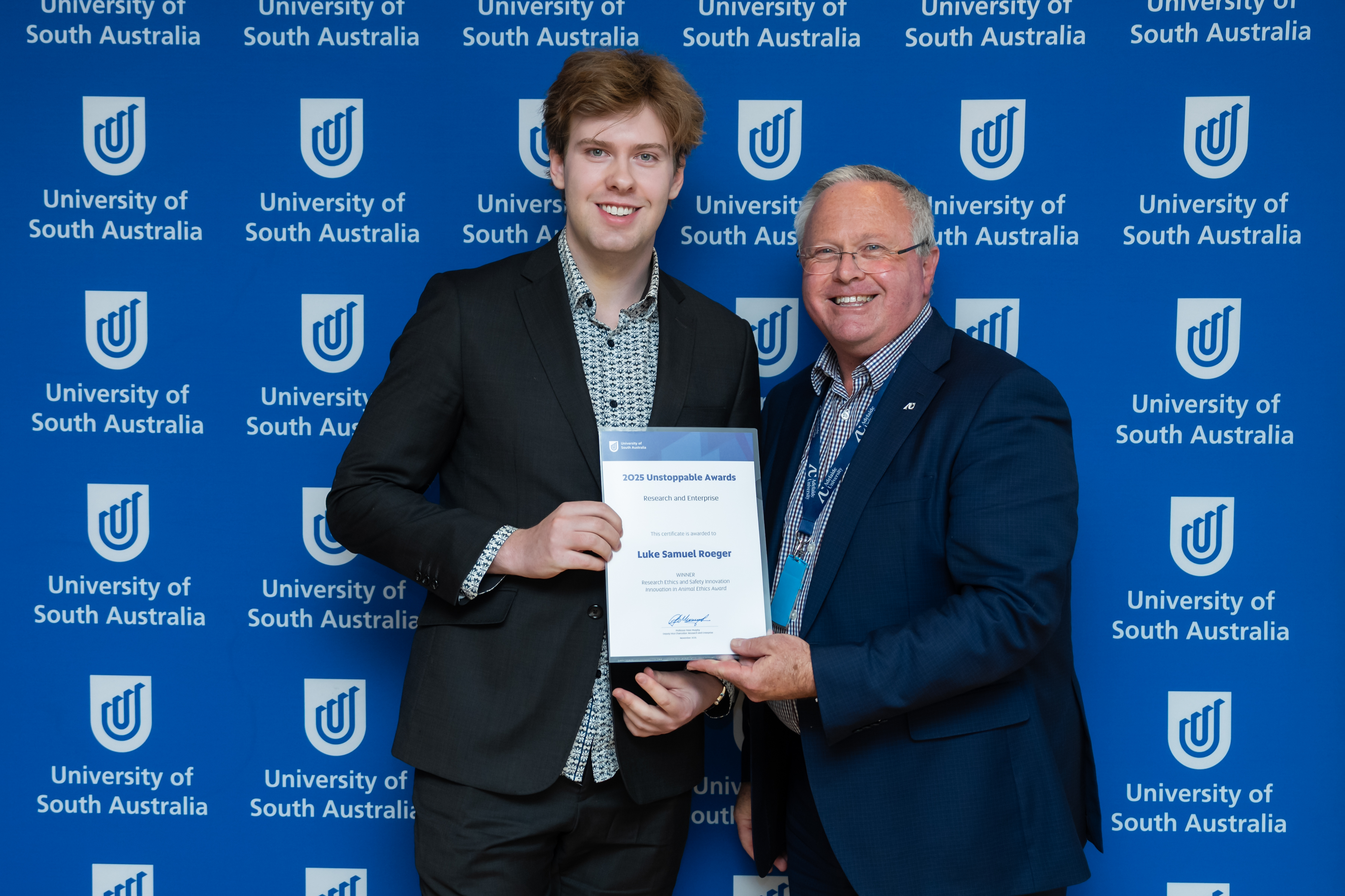 Luke Samuel Roeger is awarded the Animal Ethics Award by the Deputy Vice Chancellor: Research & Enterprise, Professor Peter Murphy