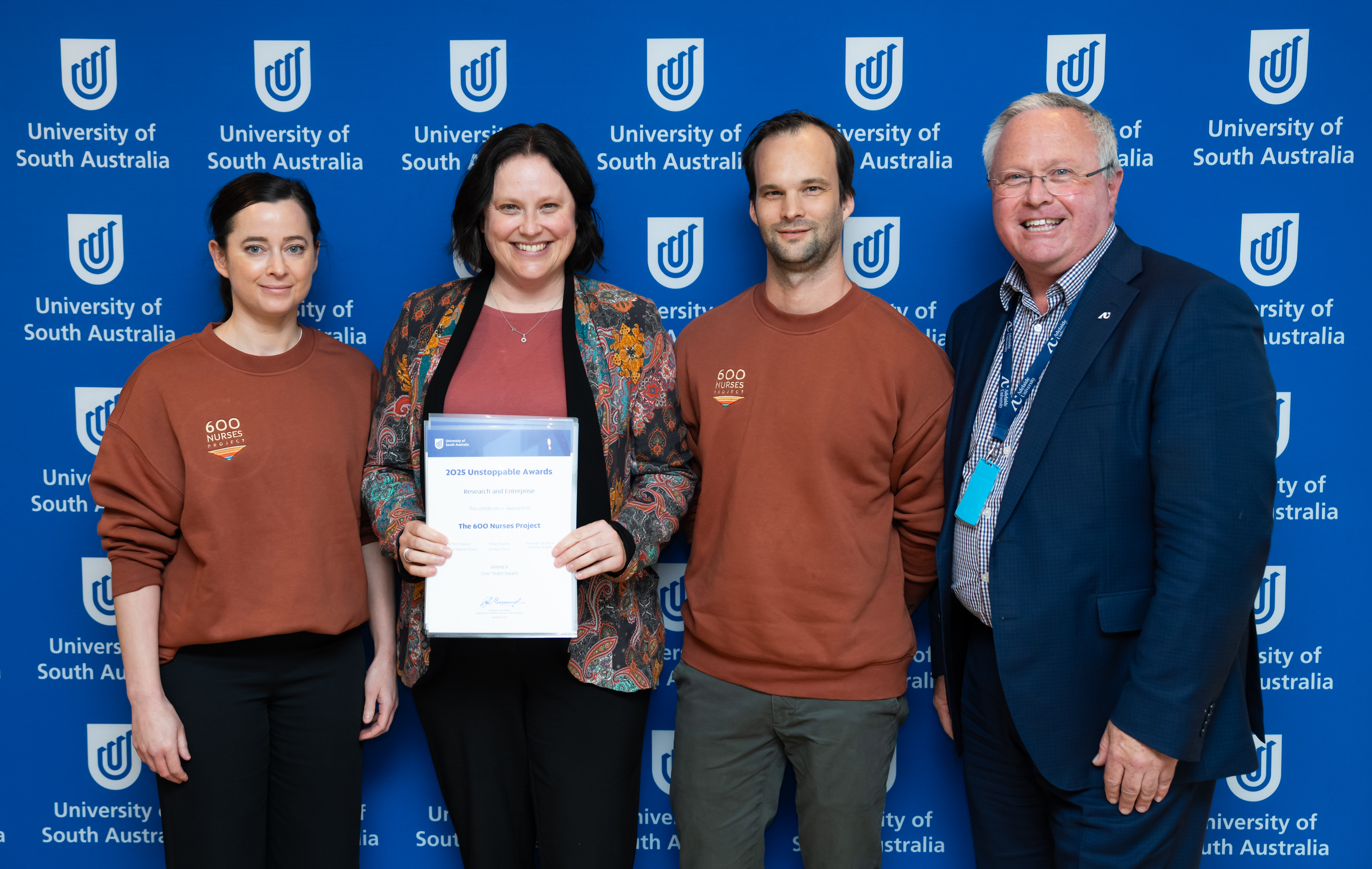 The 600 Nurses Project team is awarded the One Team Award by Deputy Vice Chancellor: Research & Enterprise, Professor Peter Murphy