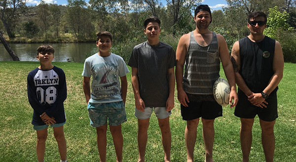 Image: Dr James Charles' five sons by the river