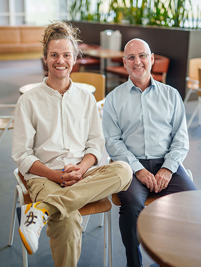Reception teacher Luke Springer with Dr Martyn Mills-Bayne.