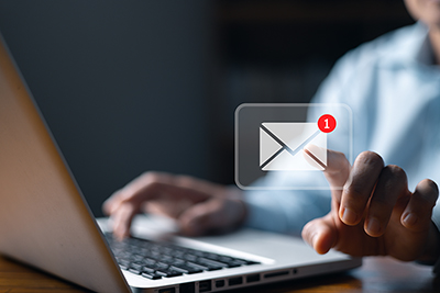 Reading an email on a laptop computer