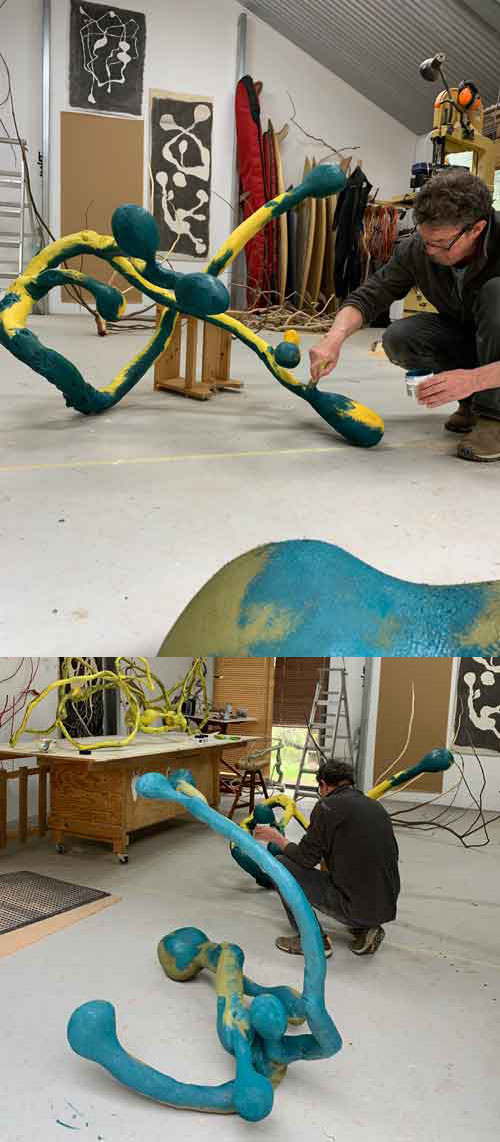 Artist Peter Walker working in his studio.