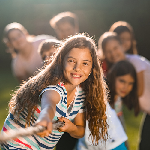 Children playing tug of war