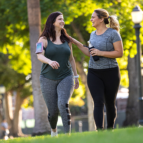 two women walking for fitness