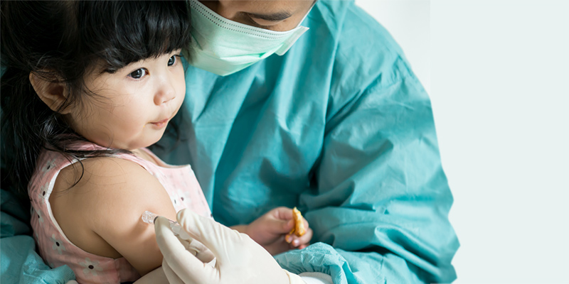 child receiving vaccination