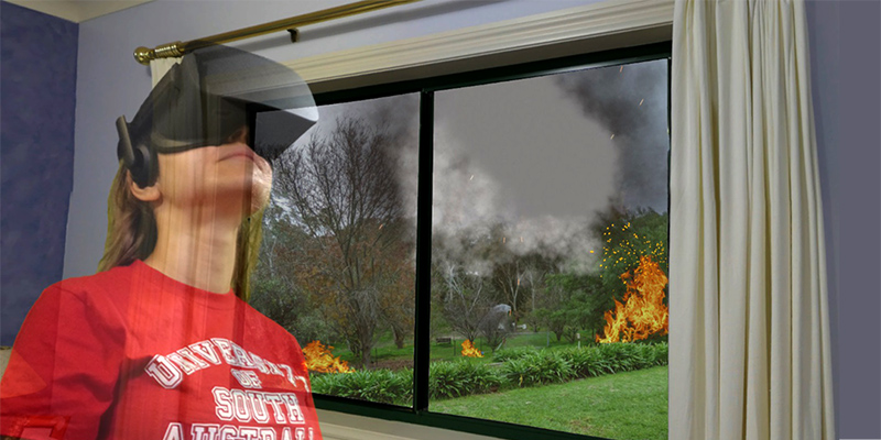 PhD student Safa Molan trialling a 3D virtual reality exercise replicating a bushfire.