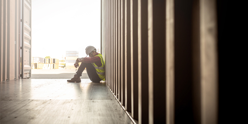 Stressed construction worker