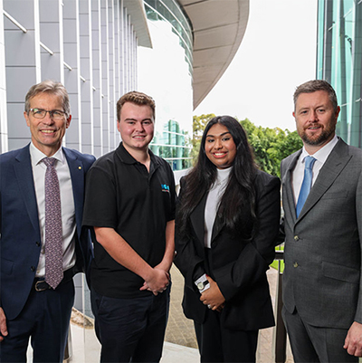 Vice Chancellors Professor Peter H&oslash;j and Professor David Lloyd are flanked by UniSA student Oliver Shephard-Bayly and University of Adelaide student Mahshiat Tahsin.