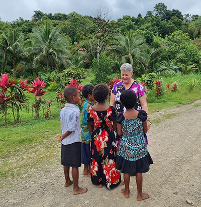 Kylie Cook with Fijian youth in the rural Nasevou Village, Naitasiri, located in the country&rsquo;s southeast.