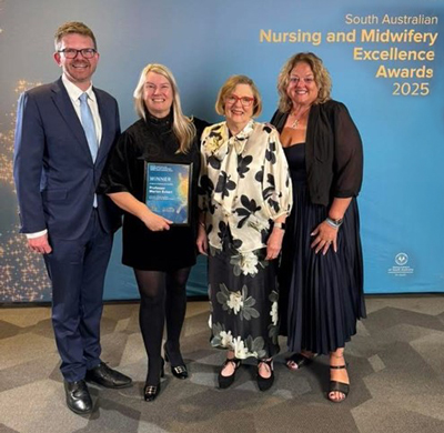 Professor Marion Eckert celebrating at the SA Nursing and Midwifery Excellence Awards. L-R: Chris Picton MP, Professor Marion Eckert, Rosemary Bryant AO, and Nat Cook MP.